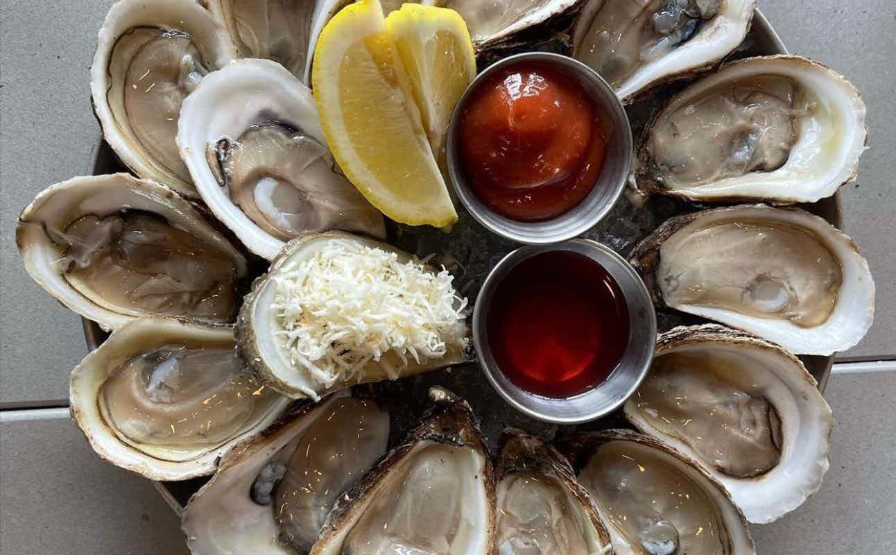 Enjoy Seafood, International and Fusion cuisine at Papi's Seafood and Oyster Bar in West End, Vancouver